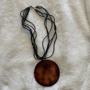Multi Layered Round Shell Pendant Necklace